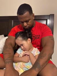 TMC Driver Bryan Celestine and his daughter. 