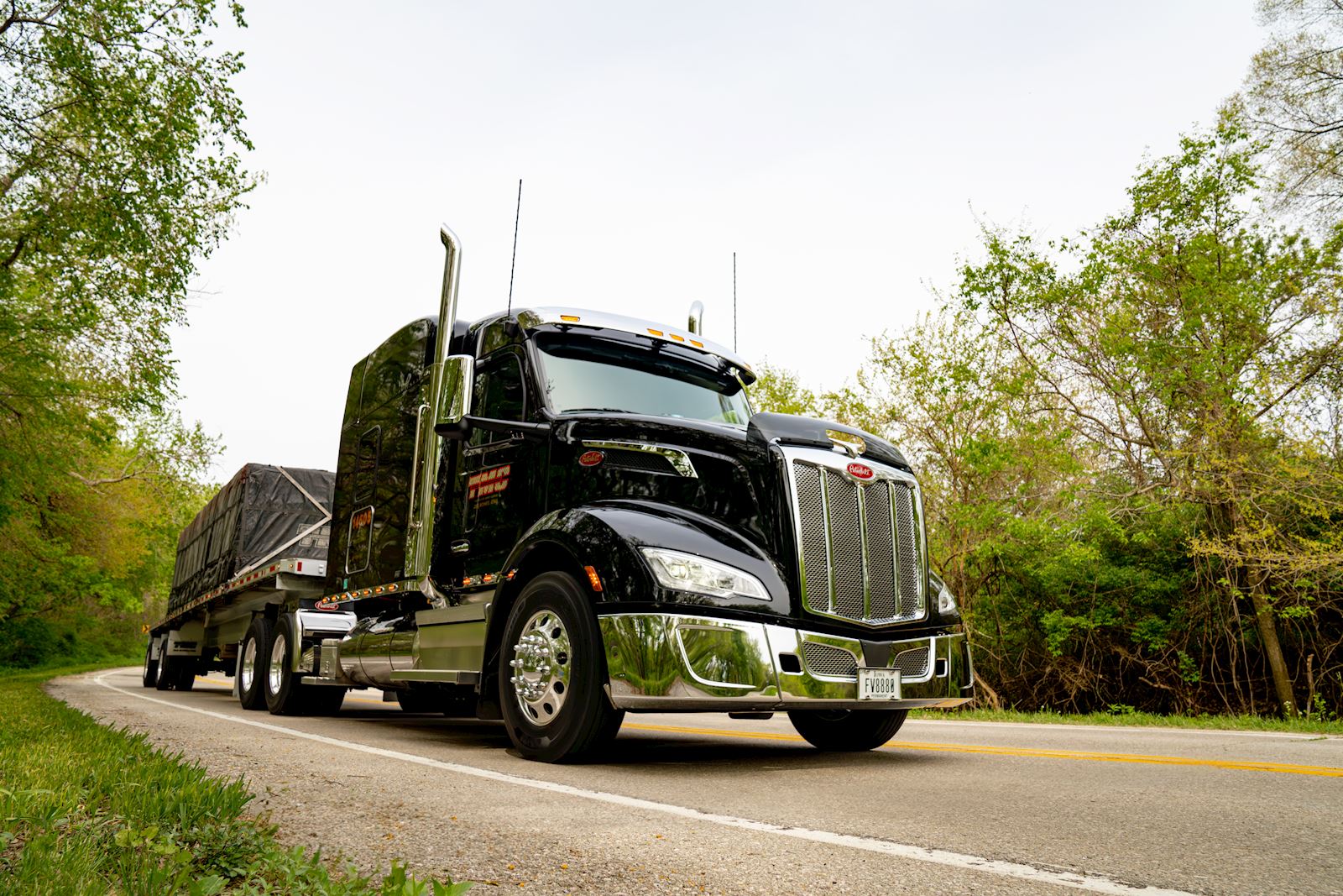 TMC flatbed truck on the highway