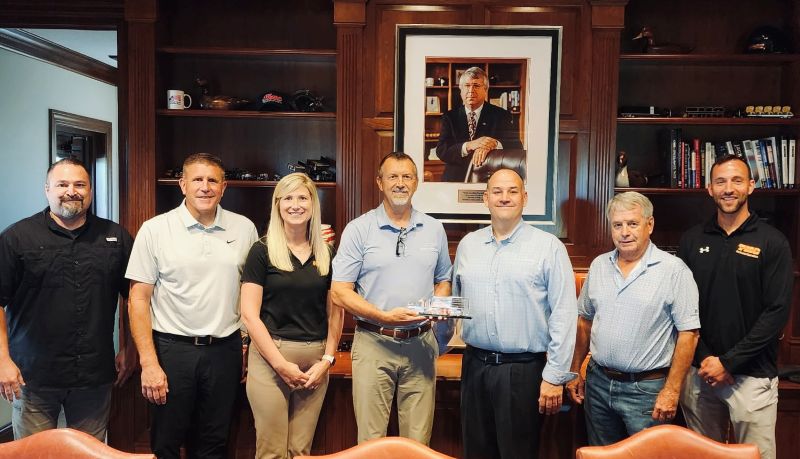 The TMC team accepting the award from KBX