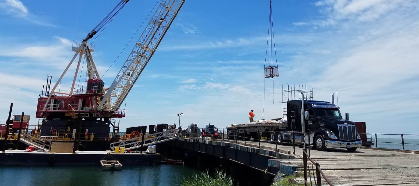 Truck being loaded on a port